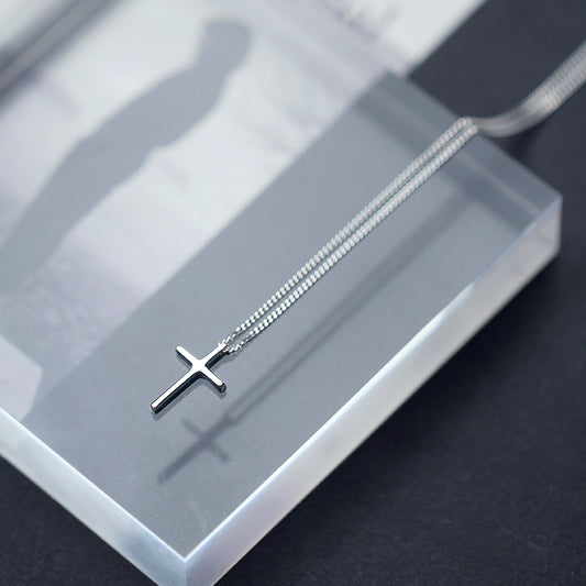 Aesthetic delicate silver cross 