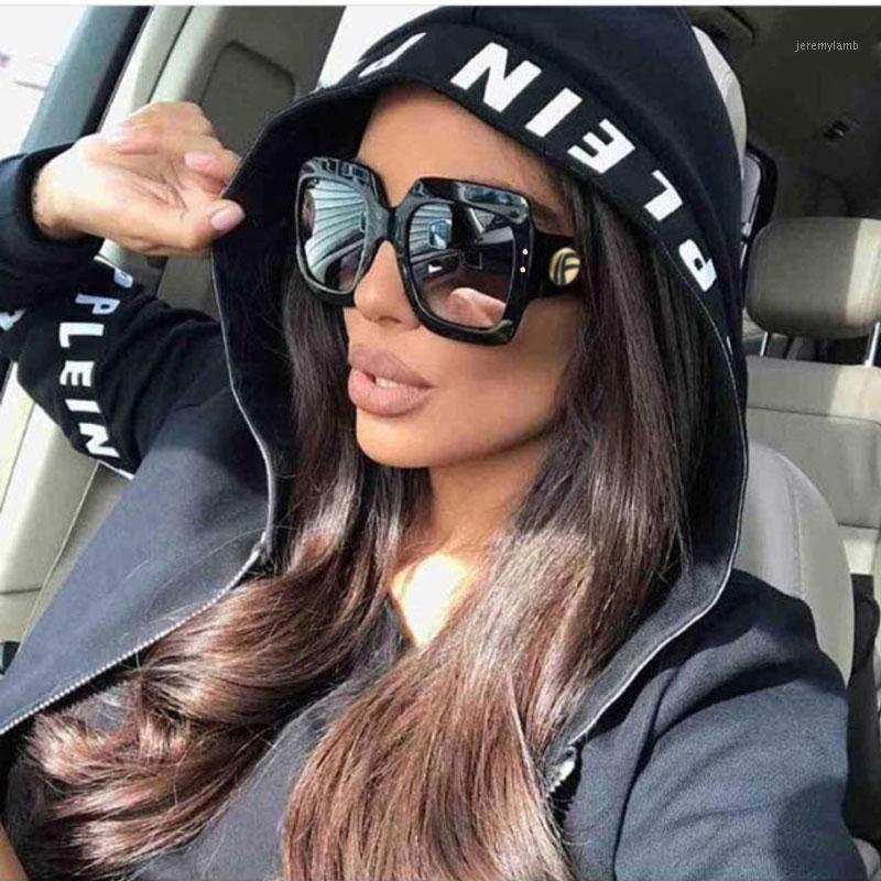 Black oversized designer clearance sunglasses